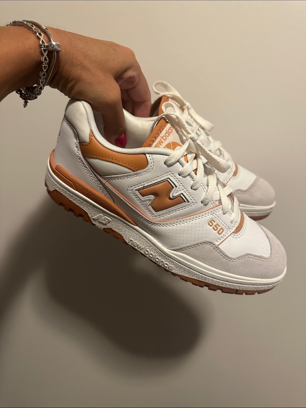New Balance Women’s 550 Leather Sneakers in White & Orange size: M8.5 W10